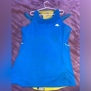 Adidas sports wear shirt with built in bra .